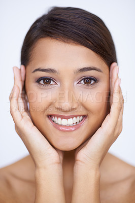 Buy stock photo Portrait, cosmetics and woman with skincare, smile and treatment on white studio background. Face, Indian person and model with beauty or dermatology with healthy skin, smooth or shine with aesthetic