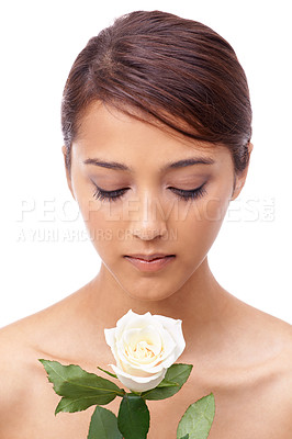 Buy stock photo Woman, rose and clean beauty with face, vegan and model for skincare cosmetics on white background. Makeup, wellness treatment or natural with shine, flower or organic for glow with healthy skin