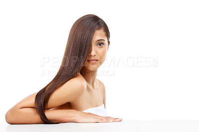 Buy stock photo Hair care, portrait and young woman in studio for cosmetic, salon and beauty treatment. Wellness, confident and female person with healthy and shiny hairstyle routine by white background with mockup.