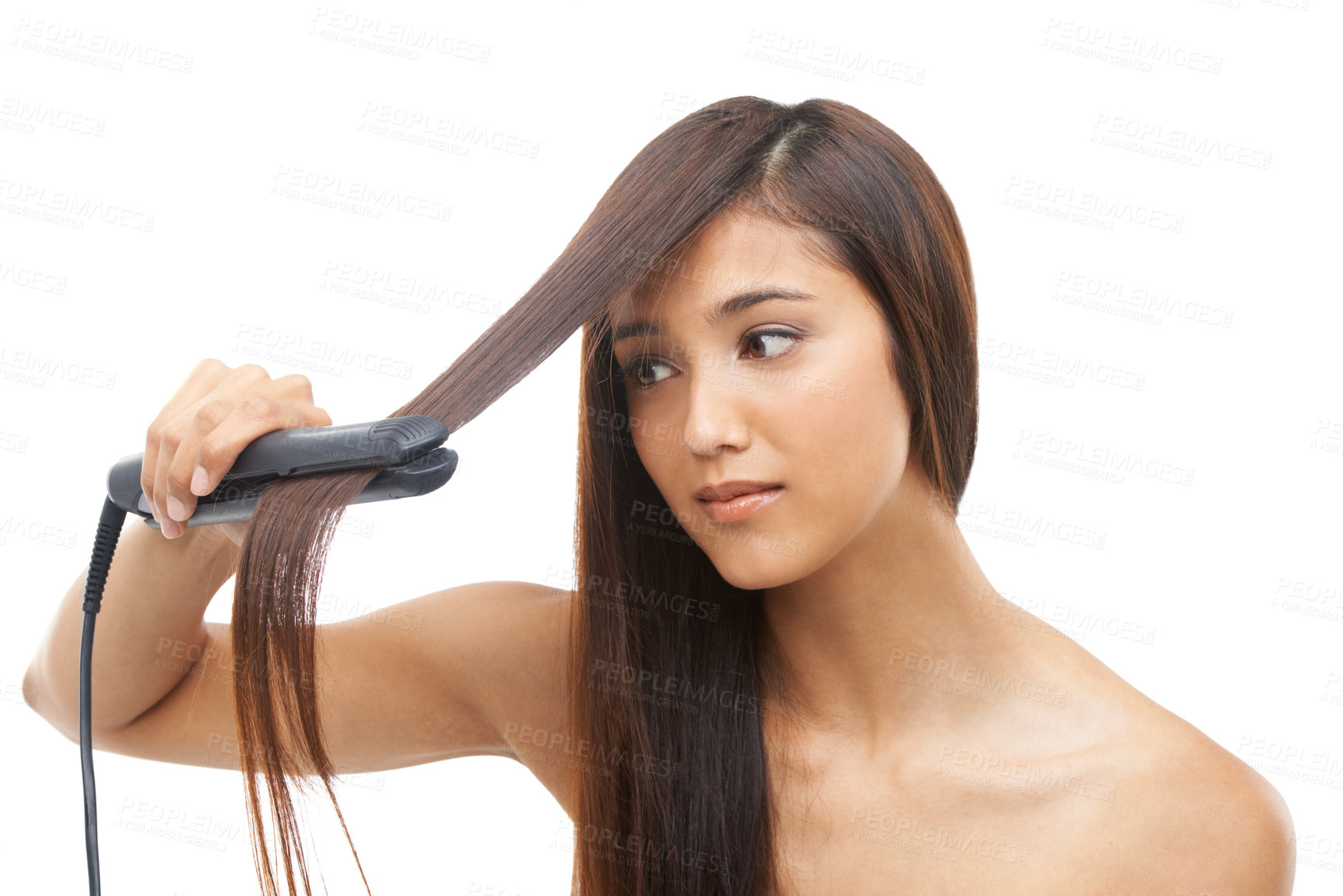 Buy stock photo Hair care, straightener and young female model in studio for cosmetic, salon and beauty treatment. Flat iron tool, confident and woman with healthy and shiny hairstyle routine by white background.