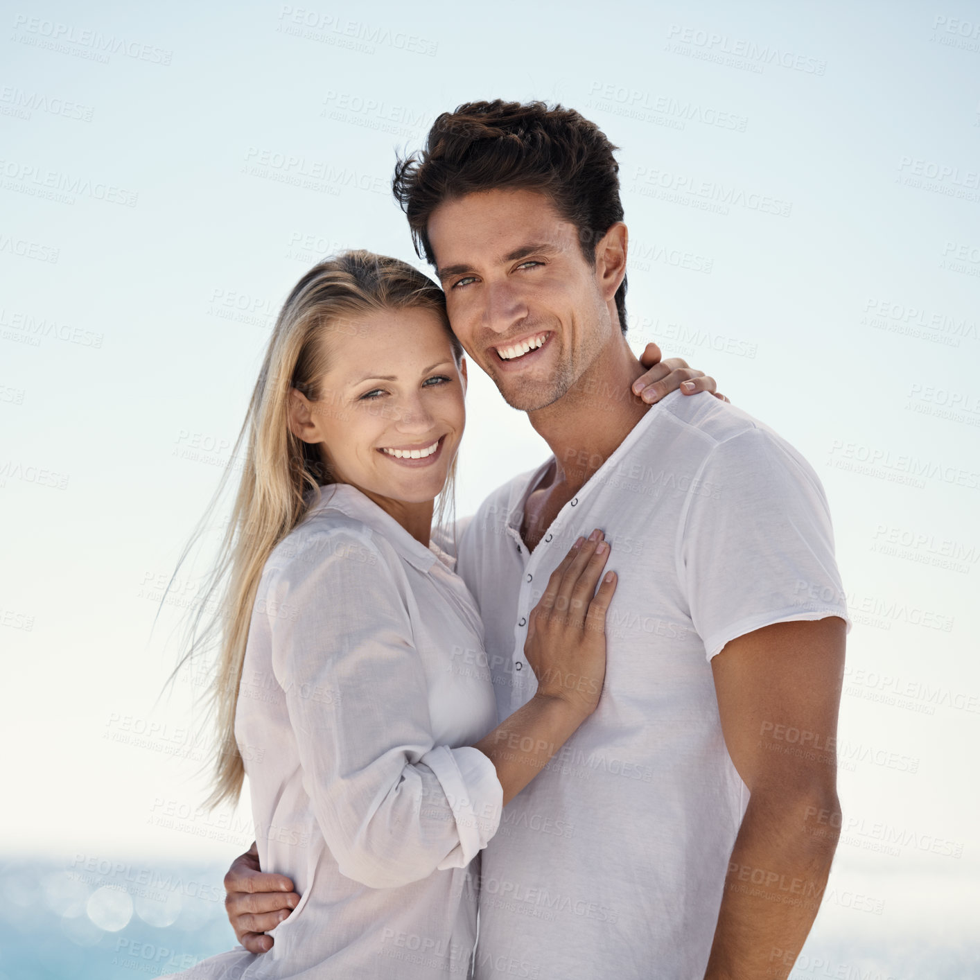 Buy stock photo Couple, beach portrait and hug with love, support and care on a date by the sea with romance on vacation. Holiday, ocean and outdoor with summer travel in nature relax on a break and trip by water