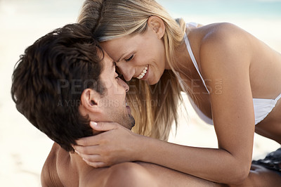 Buy stock photo Couple, face and happy on beach with love, romance and bonding on vacation, holiday or travel. Relationship, man and woman with care, affection and peace in nature with relax or carefree by ocean 
