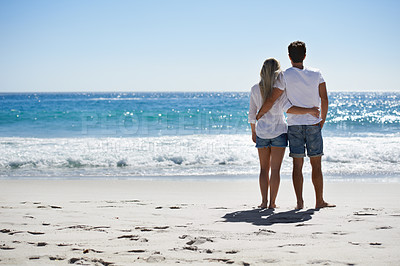 Buy stock photo Beach, hug and back of couple in nature with freedom, romance or care, trust or support. Love, embrace and people at the sea for travel, fun and summer, vacation or adventure while bonding in Florida
