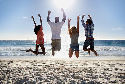 Buy stock photo Jump, beach or back of friends on holiday vacation in the air together in summer at sea. Outdoor, group or excited men with happy women in fun celebration of freedom by ocean, sand, nature for travel