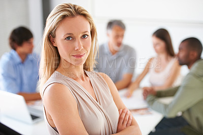 Buy stock photo A beautiful business manager crossing her arms in the boardroom