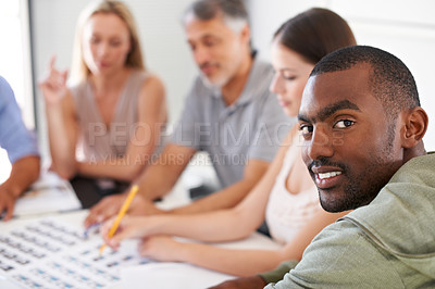 Buy stock photo Magazine, design and portrait of man in meeting with team project, collaboration and creative planning. African, person and photographer work at table with catalog, portfolio and editing process