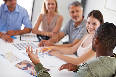 Buy stock photo Group, creative business people or planning at desk in meeting, brainstorming strategy or discussion in startup office. Team, designers at table or collaboration for photography, cooperation or smile