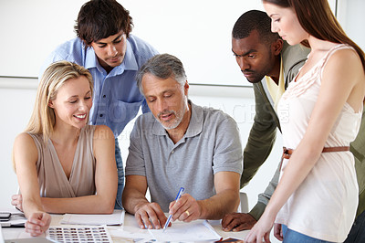 Buy stock photo A group of business people choosing models for an advertising campaign they are working on