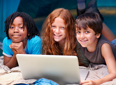 Buy stock photo Children, laptop and relax in tent portrait together with happiness and online games for holiday or vacation. Kids, smile and playing with computer on website, streaming or search on internet