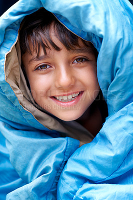 Buy stock photo Boy, child and tent portrait for camping, relax and happy summer vacation in outdoor travel. Young camper, smile and wrapped in sleeping bag, adventure or nature with recreation for childhood