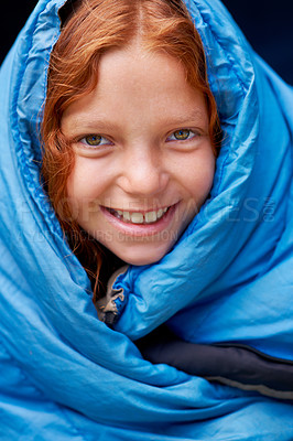 Buy stock photo Sleeping bag, camping and portrait of child in tent for rest, relax and comfortable in gear. Travel, youth and face of ginger girl in sleep sack for adventure on holiday, vacation or weekend outdoors