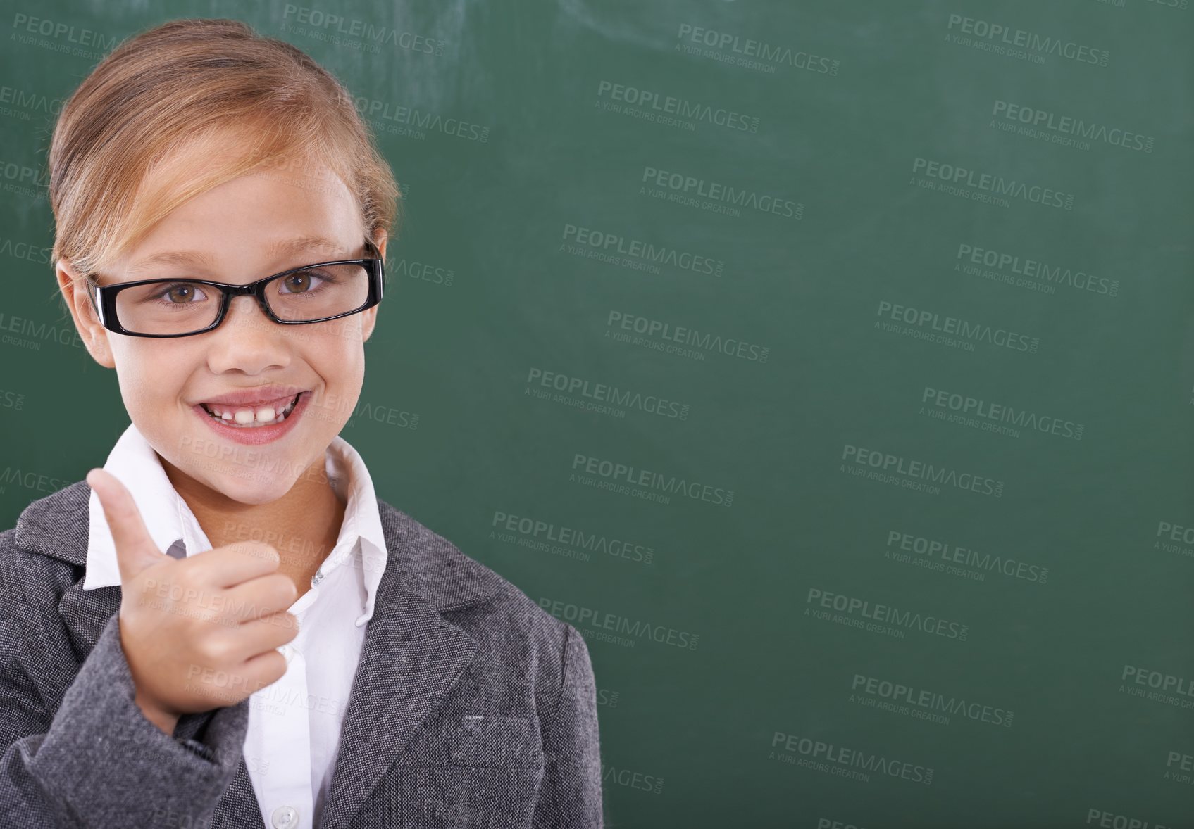 Buy stock photo Child by chalkboard, thumbs up and education, learning or school success, like and support with mockup space. Portrait of of happy kid, girl or student in glasses with yes and ok hands in classroom 