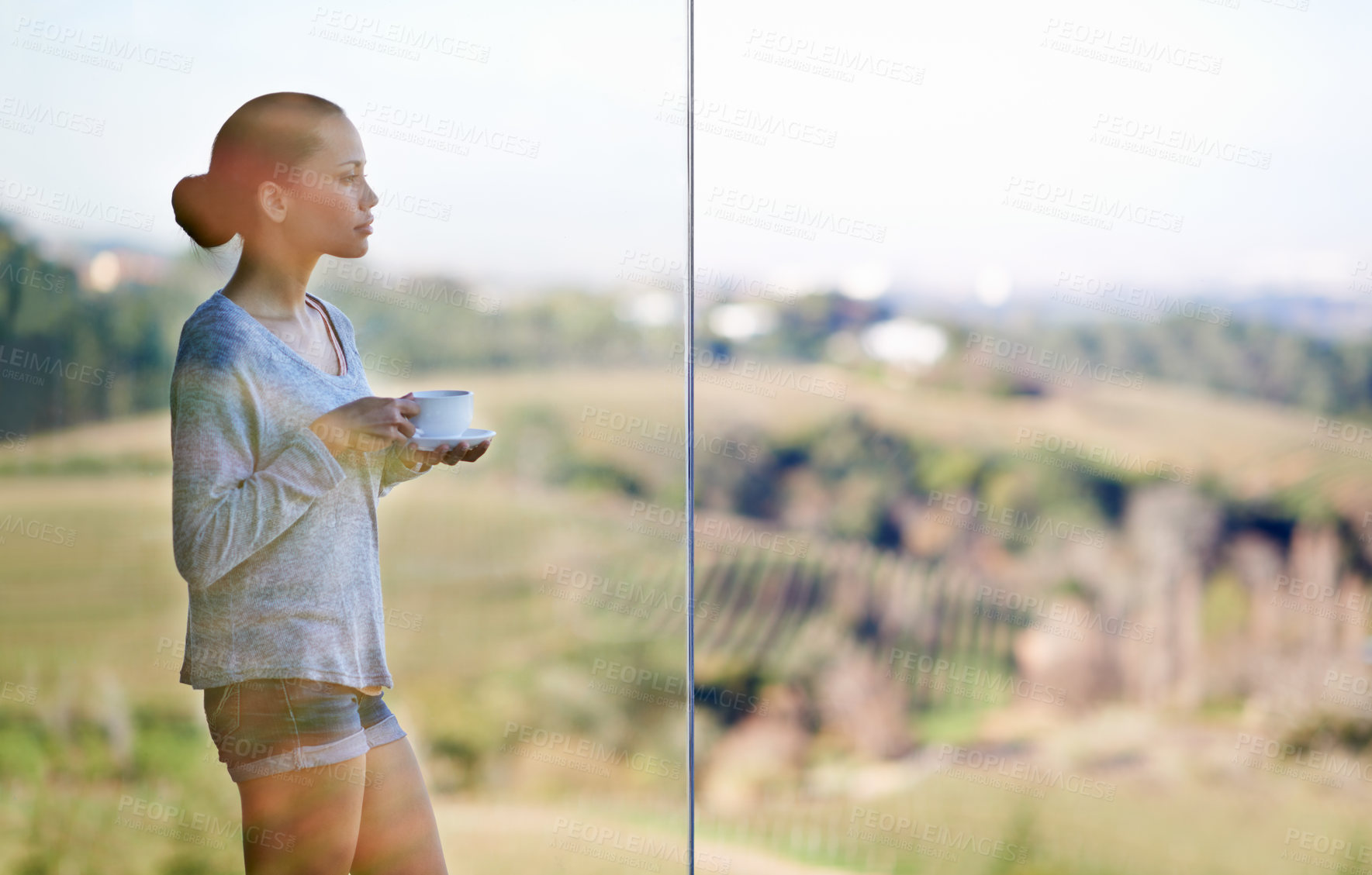 Buy stock photo Woman, coffee and thinking at window, view with drink or warm beverage for morning routine and reflection in nature. Peace, calm and espresso for caffeine, ponder life with tea cup in countryside