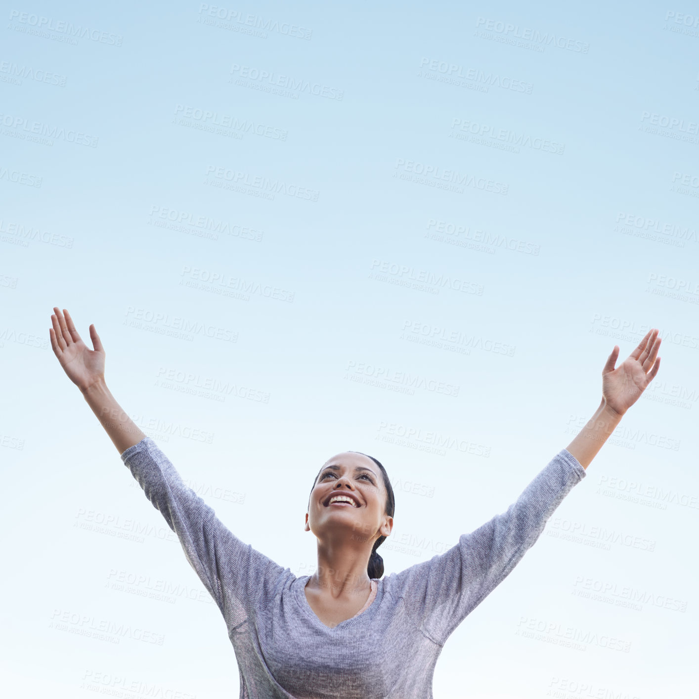 Buy stock photo Woman, arms up and blue sky with freedom and happiness outdoor, health and wellness, stress relief and gratitude, Celebration, joy and smile on face in nature with mockup space, praise and thanks