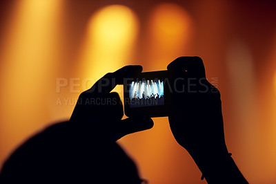 Buy stock photo Hands, cellphone or image of band at concert, music event or audience with flashlight in bokeh. Person, photography or graphic on smartphone, technology or celebration with crowd at disco performance