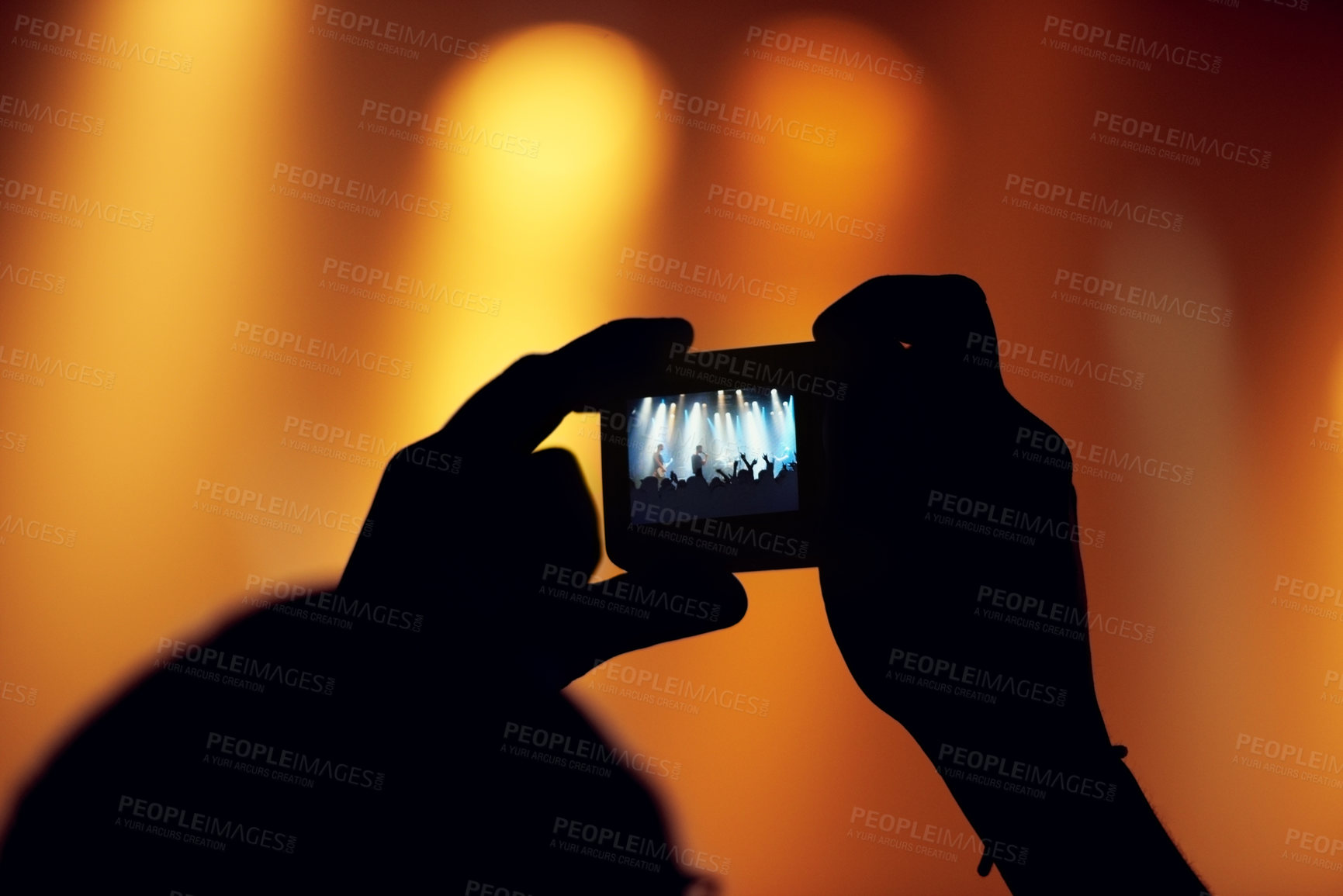 Buy stock photo Hands, cellphone or image of band at concert, music event or audience with flashlight in bokeh. Person, photography or graphic on smartphone, technology or celebration with crowd at disco performance