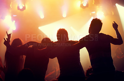 Buy stock photo Celebrating their favroutie band!