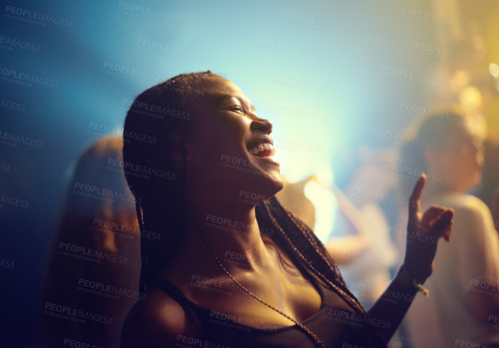 Buy stock photo A young girl partying in a club and moving to the music. This concert was created for the sole purpose of this photo shoot, featuring 300 models and 3 live bands. All people in this shoot are model released.