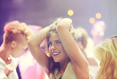 Buy stock photo Night, club and happy woman at party to dance with energy to techno, music festival and rave at concert event. Girl, smile and celebration at nightclub with confidence, pride and freedom in movement