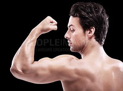Buy stock photo Back of man, bodybuilder and bicep flex in studio, black background and exercise for power. Strong, sexy and topless male model, sports athlete and arm muscle for pride, training and fitness results