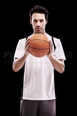 Buy stock photo Basketball, portrait and fitness man with ball in studio for training, wellness or exercise challenge on black background. Workout, face and male athlete with handball, catch or performance match