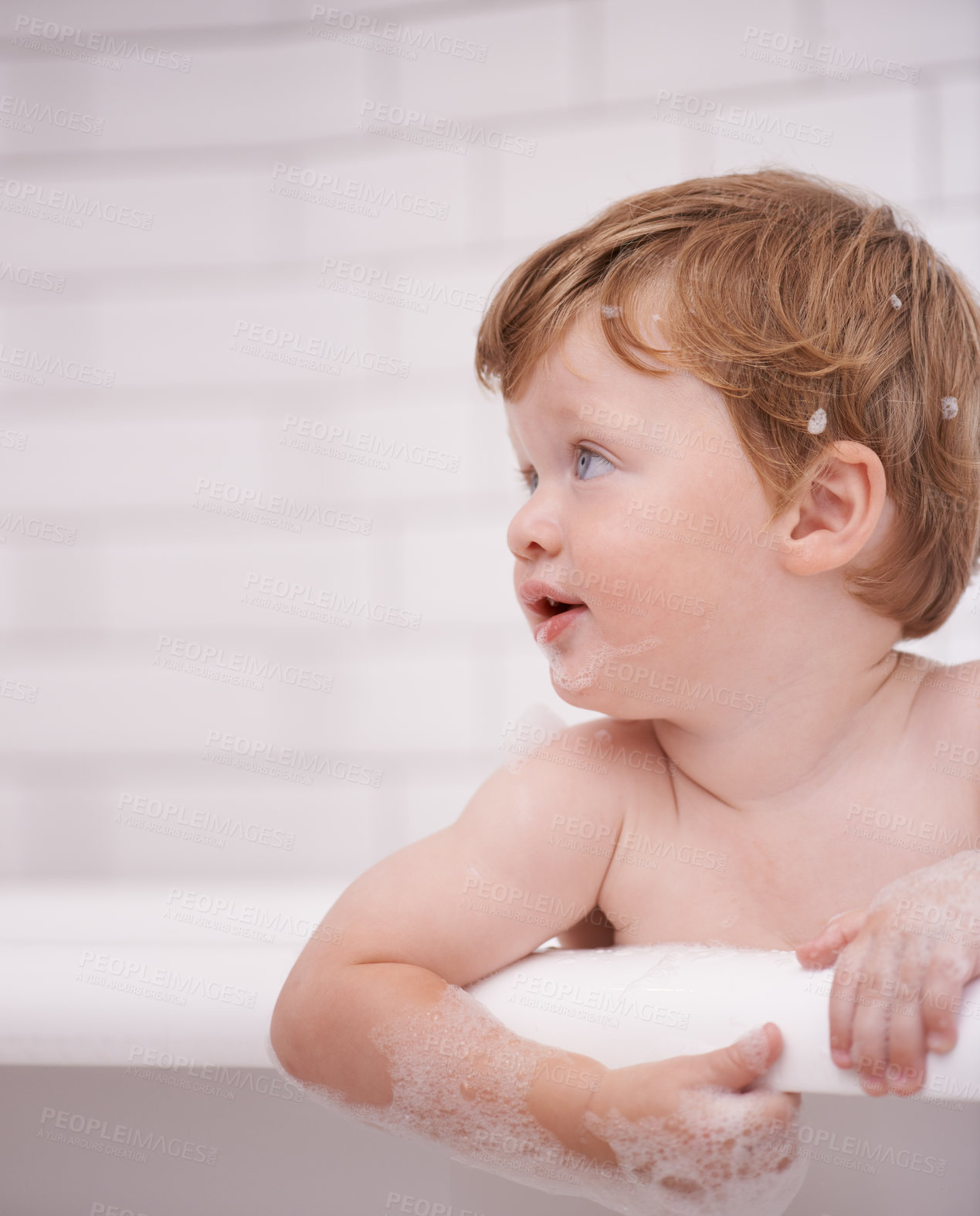 Buy stock photo Toddler in bathtub, cleaning with bubbles and soap for morning routine with health, wellness and body care. Male baby washing in foam with hygiene or boy child thinking in water to relax in bathroom