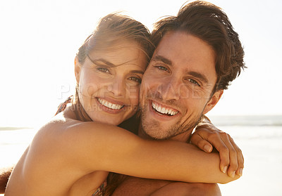 Buy stock photo Happy couple, portrait and hug on beach for embrace, love or support in care on holiday or outdoor weekend together. Face of man and woman smile for trust or summer travel in romance by ocean coast