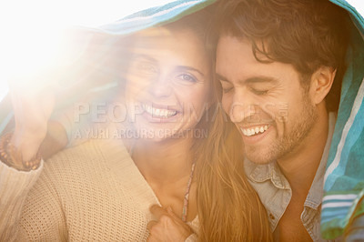 Buy stock photo Couple, towel cover head and outdoor with smile, care and embrace for holiday in summer sunshine. Man, woman and portrait with bonding, happy and relax with love with tourism, vacation and break