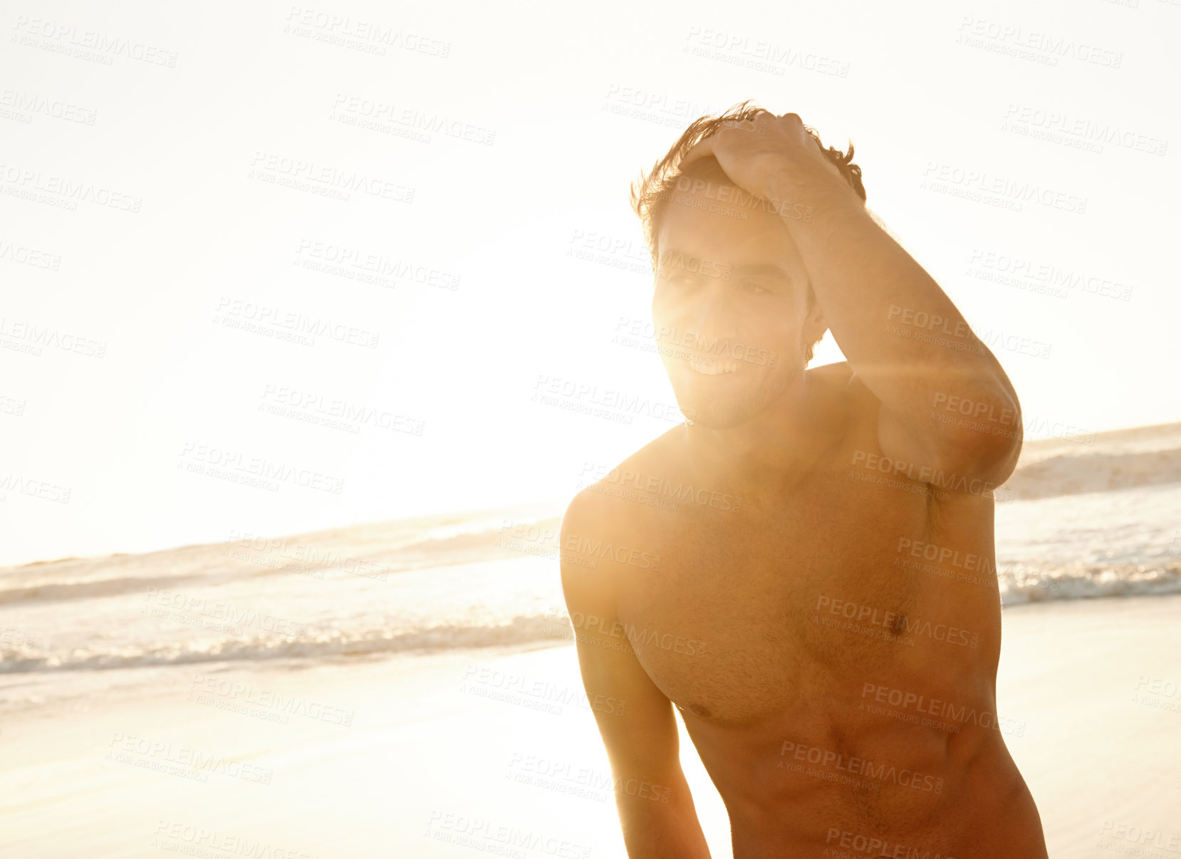 Buy stock photo Man, smile and freedom at the beach on a holiday and summer vacation outdoor with travel. Happy, sea and male person from California by the ocean with confidence and lens flare from trip and journey