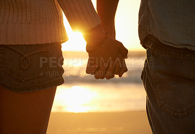 Buy stock photo Couple, holding hands and beach or sunset love at waves for vacation journey, peace or support. Partnership, fingers and environment at ocean for calm holiday or healing relationship, travel or trust