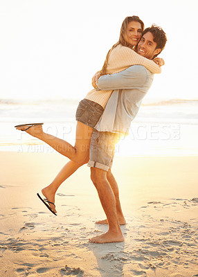 Buy stock photo Happy, hug and portrait of couple at beach on vacation, adventure or holiday for valentines day. Sunset, love and man carry, embrace and bond with woman by ocean for weekend trip on romantic date.