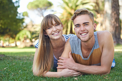 Buy stock photo Couple, smile in portrait and relax on grass in park, love and commitment in healthy relationship with picnic outdoor. Happy, care and trust with people in nature or public garden for romantic date