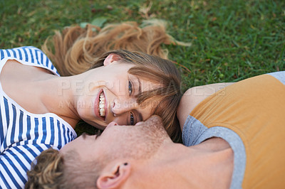 Buy stock photo Grass field, love and portrait of happy woman, couple or people relax for outdoor sunshine, wellness or romantic date. Smile, commitment and face of woman lying with partner on pitch, garden or lawn