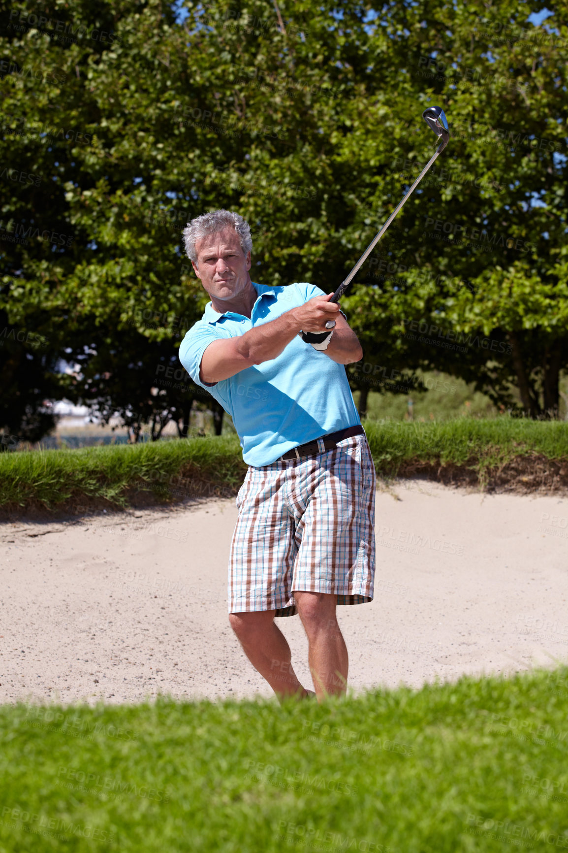 Buy stock photo Sports, portrait and old man with golf club swing outdoor for fitness, training and practice. Face, golfing and senior male golfer swinging driver in a park, serious and enjoying retirement hobby