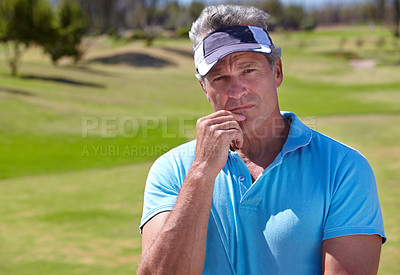 Buy stock photo Portrait of a mature male golfer thinking about his next shot