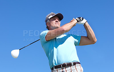 Buy stock photo Golf, swing and elderly man with driver outdoor for training, hobby and sports on blue sky background. Club, swinging and active senior male golfer on field for retirement fitness, match or practice