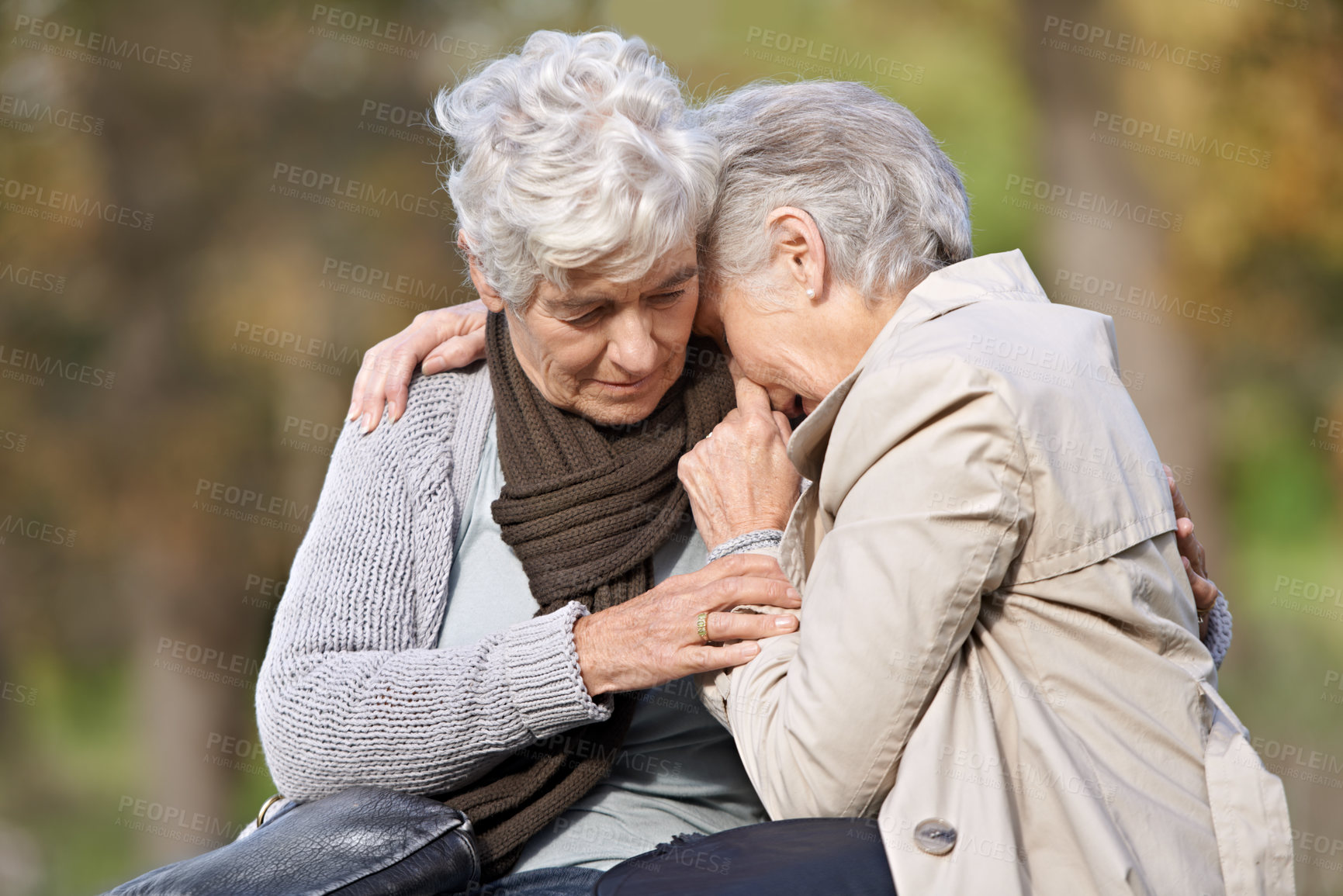 Buy stock photo Cropped view of a senior woman caring for her friend
