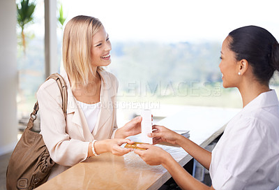 Buy stock photo Shopping, happy and a woman with a credit card for a cashier for skincare, service and care of skin. Smile, talking and a female customer speaking to a worker about a product after making a payment