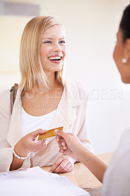 Buy stock photo Smile, shopping and woman with credit card for salesperson in shop or retail store. Cashier, female person and plastic money for financial purchase, customer payment and transaction in boutique.