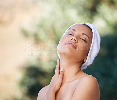 Buy stock photo Nature, skincare and young woman at spa with towel for wellness or healthy skin treatment. Beauty, outdoor and face of calm female person with cosmetic, body or dermatology routine at salon resort.