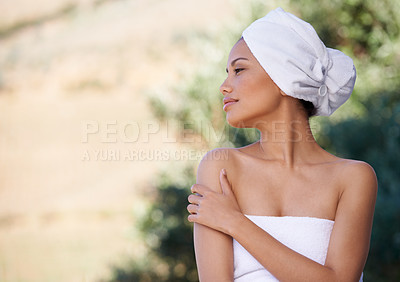 Buy stock photo Spa, beauty therapy and woman in nature in towel for health, skincare touch and wellness. Relax, body and young person at salon for pamper treatment, peace and girl thinking of outdoor resort mockup