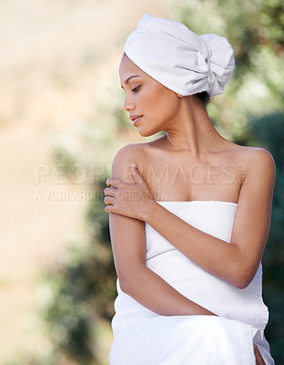 Buy stock photo Spa, touch skin and woman in towel for beauty, healthy skincare and wellness outdoor. Relax, body and young person at salon for pamper treatment, luxury therapy or calm peace of girl in nature resort