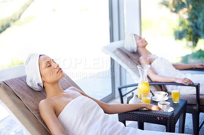 Buy stock photo Spa, woman and sleeping on massage bed with towel for wellness, drinks and beauty treatment for body care. Person, relax and stress relief at resort, salon table and luxury on holiday or vacation