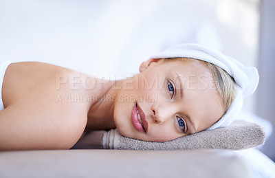 Buy stock photo Portrait, woman and relax on table in spa for skincare, beauty and luxury treatment for wellness. People, rest and face of calm person on bed in hotel for massage or dermatology care for body