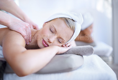 Buy stock photo Hands of masseuse, woman get back massage in spa and wellness with peace, tranquility and holistic treatment. Stress relief, zen and female person at luxury resort with self care and body healing