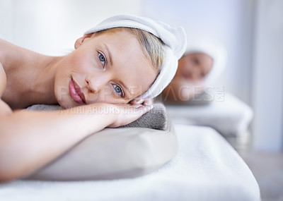 Buy stock photo Spa, portrait and woman lying on table for skincare, beauty and luxury treatment for wellness. People, relax and face of calm person on bed in salon or hotel for massage or dermatology care for body