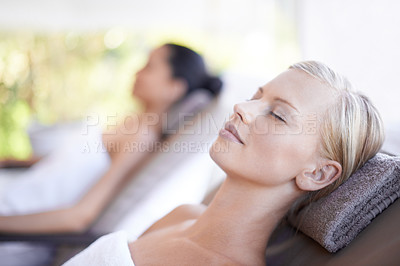Buy stock photo Spa, woman and wellness on massage bed with relax for skincare, zen and beauty treatment for body care. Person, sleeping and physical therapy at resort, salon table and luxury on holiday or vacation
