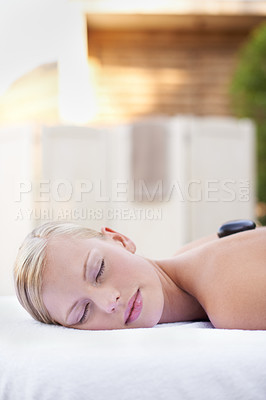 Buy stock photo Spa, woman and sleeping on massage bed with smile for wellness, mock up and beauty treatment for body care. Person, relax and physical therapy at resort, salon table and luxury on holiday or vacation