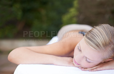Buy stock photo Luxury, woman and sleeping on massage bed with comfort for wellness, mock up and beauty treatment or body care. Person, relax or physical therapy at resort, salon table and spa on holiday or vacation