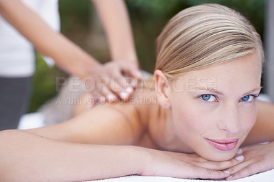 Buy stock photo Face, woman in portrait and back massage at spa with holistic treatment and self care. Wellness, young female person relax at luxury resort with masseuse and physical therapy with healing and zen